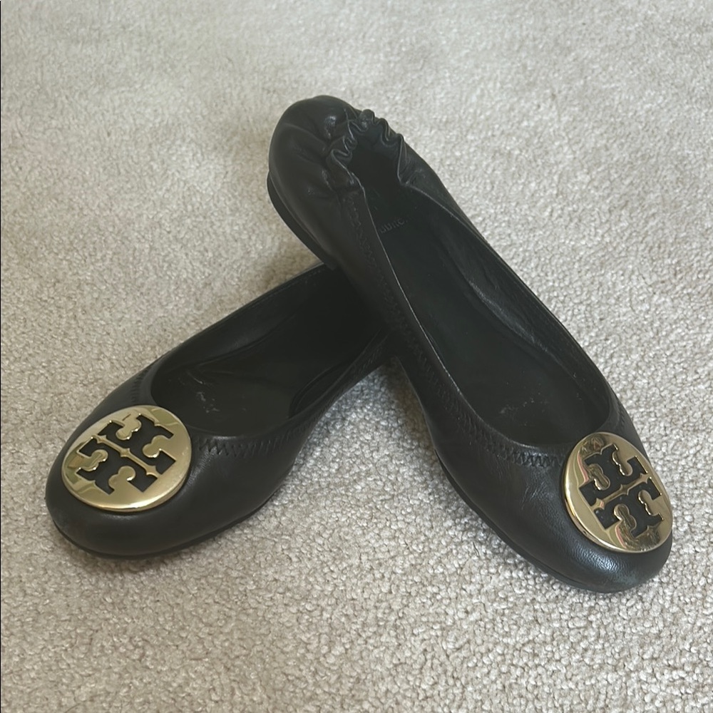 Tory Burch Black and Gold Flats with Iconic Medallion